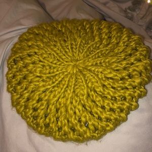 Knitted beret yellowish green